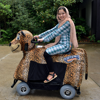 Woman riding jaguar ScooterPal