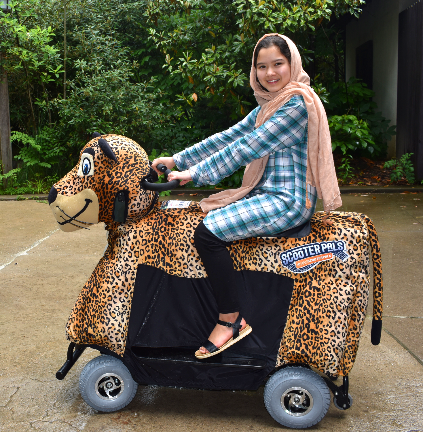 Girl on leopard ScooterPal