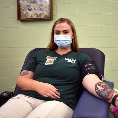 Akron Zoo employee giving blood