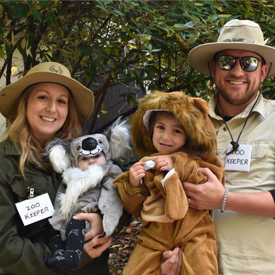 Family in zookeeper and animal costumes