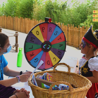 Child in pirate costume playing trivia