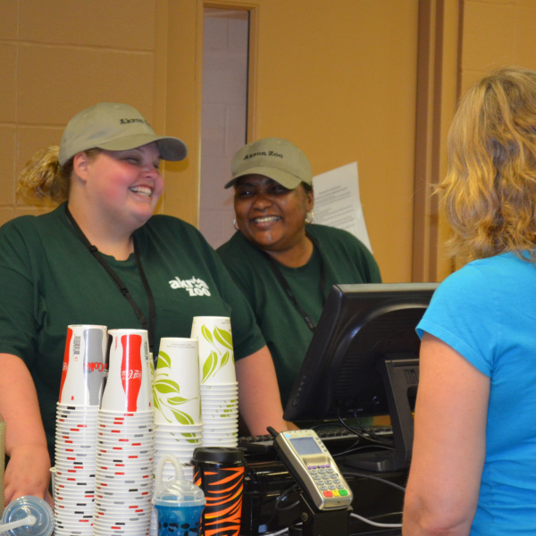 Two staff members working in food service